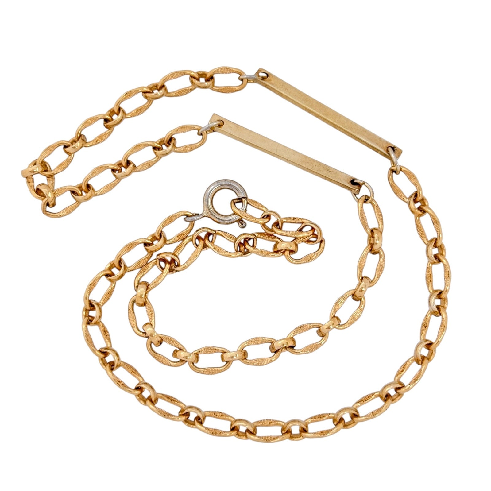 Gold chain necklace on a white background