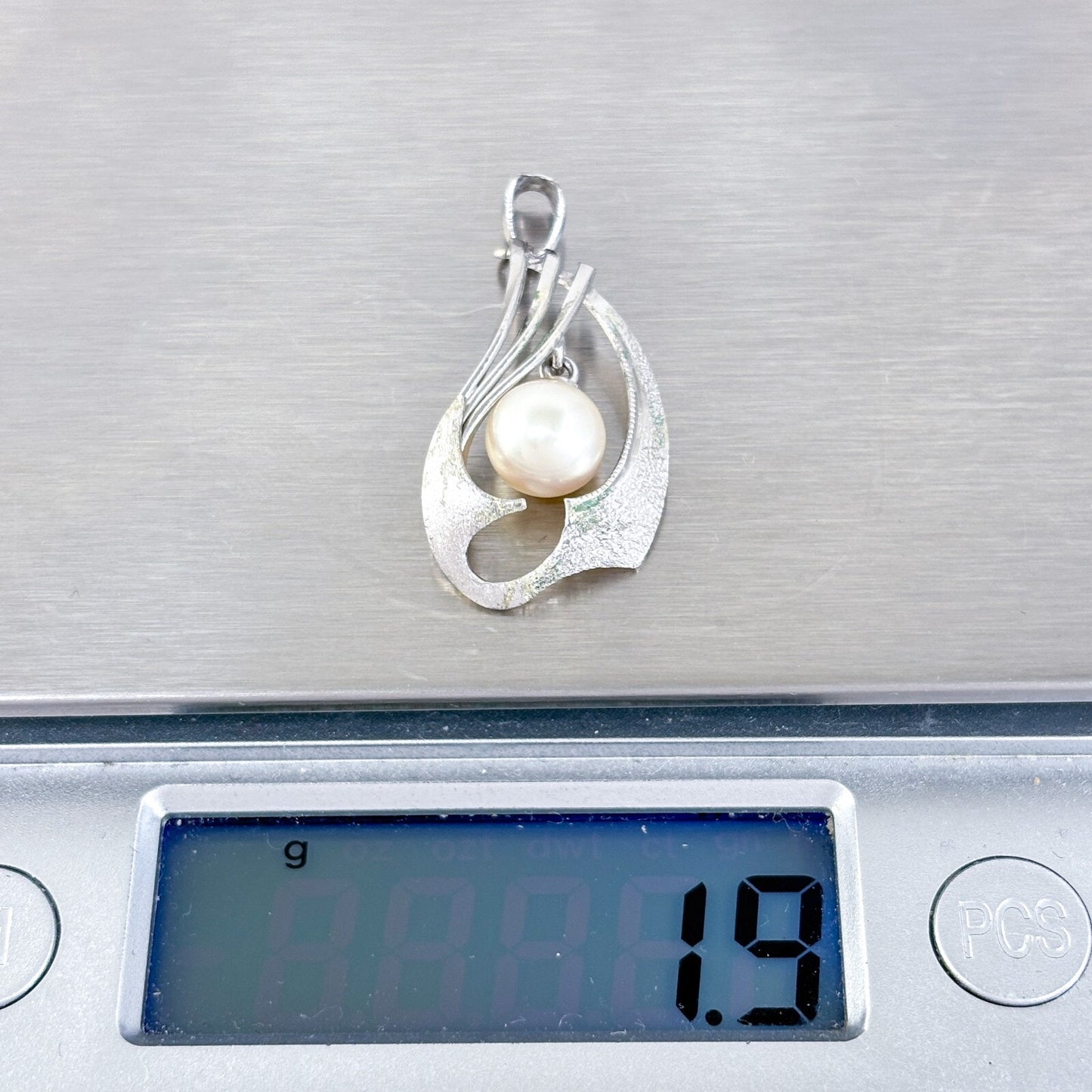 Vintage Silver-Tone Modernist Pendant with Pearl Accent