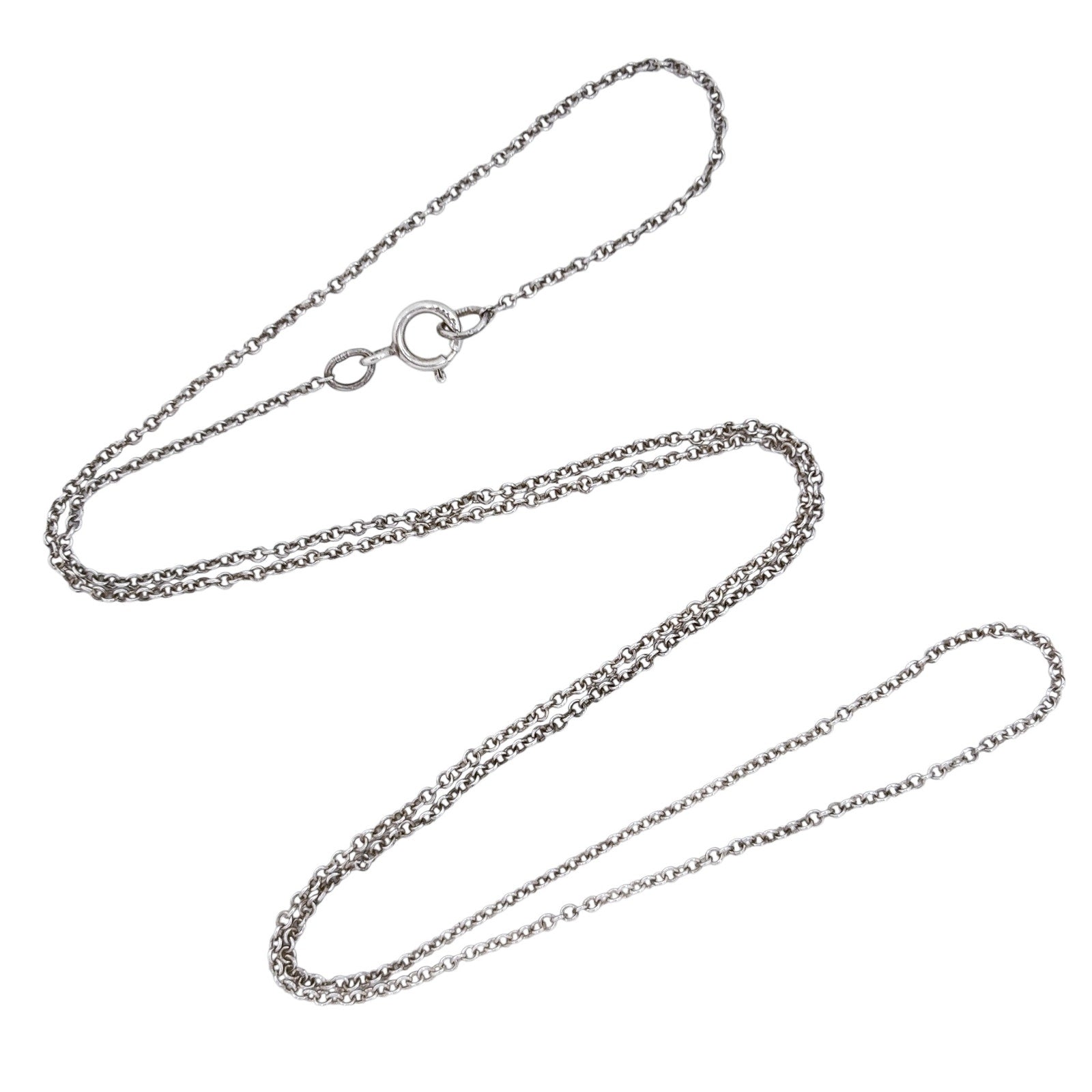 Silver chain necklace on a white background