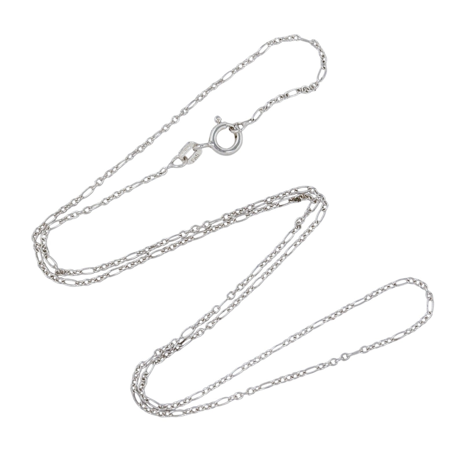 Silver chain necklace on a white background