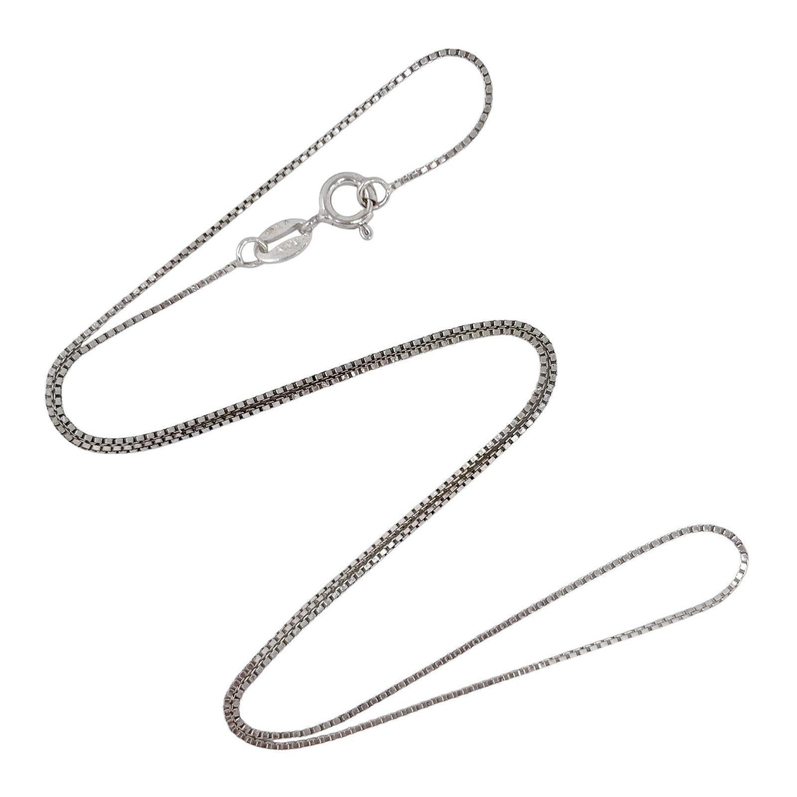 Silver box chain necklace on a white background
