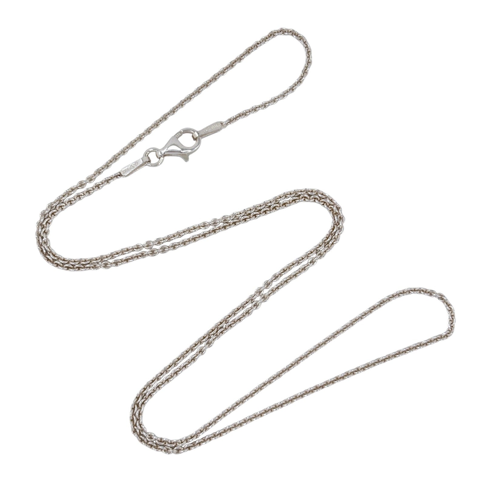 Silver chain necklace on a white background